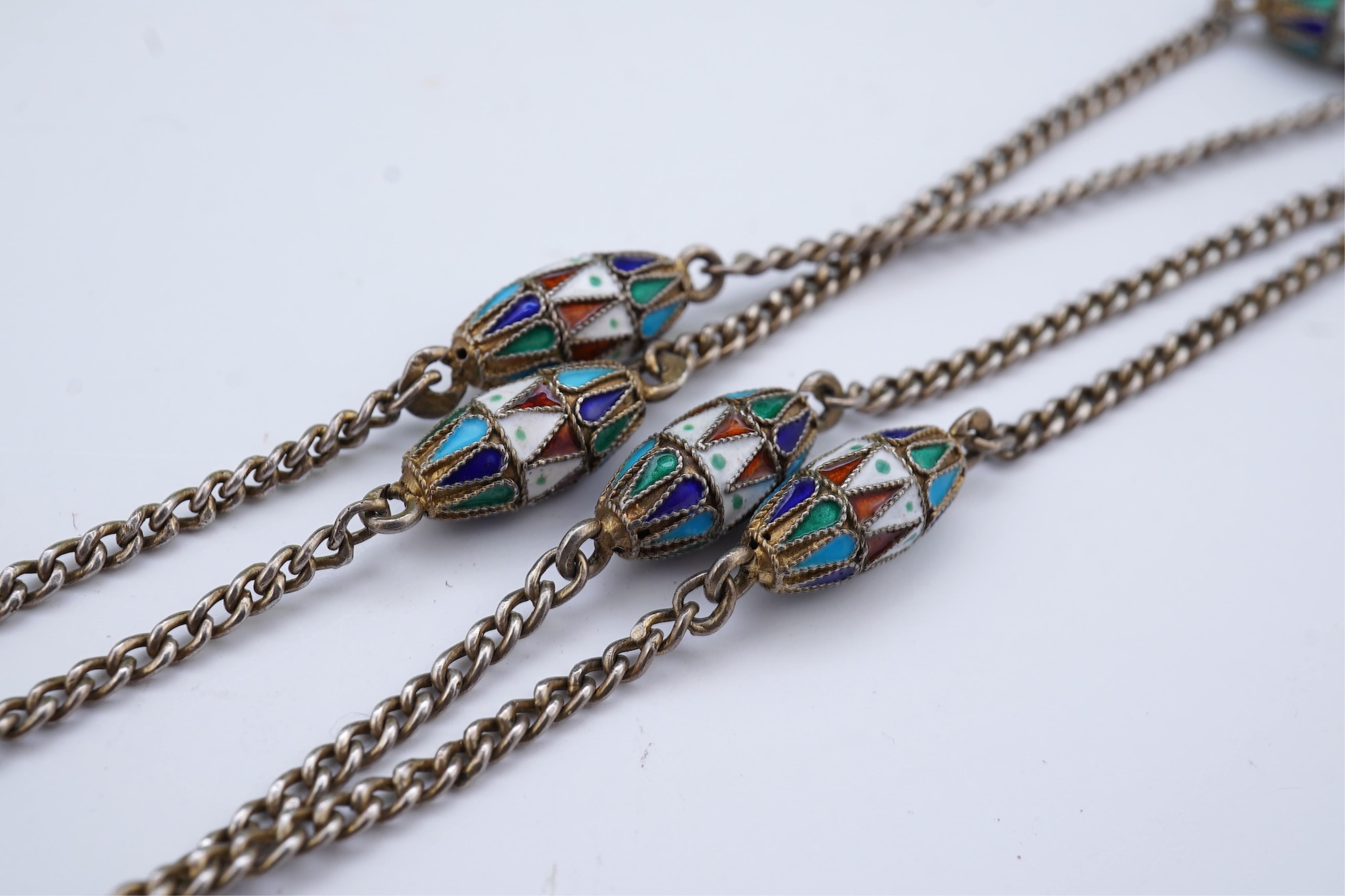 A silver and enamel long chain necklace, Russia, early 20th century
